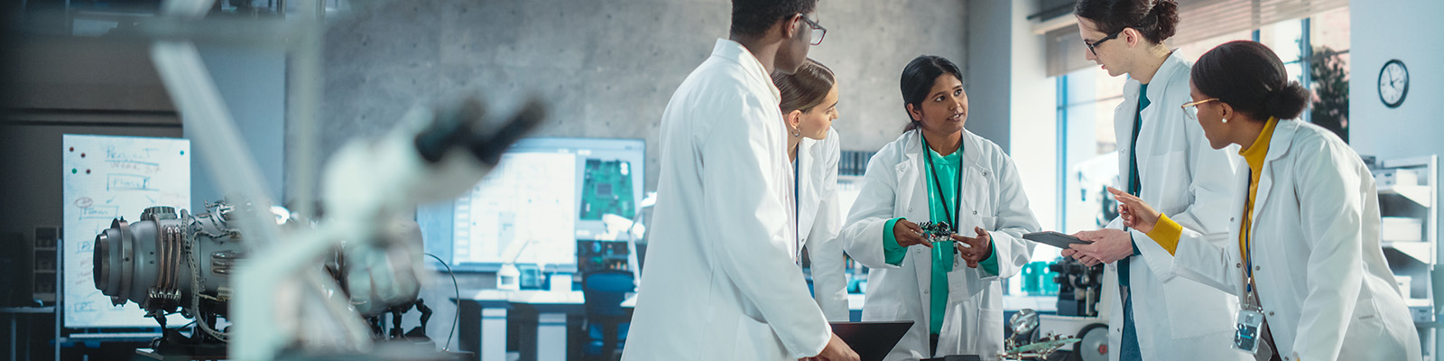 colleagues working in a chemical laboratory