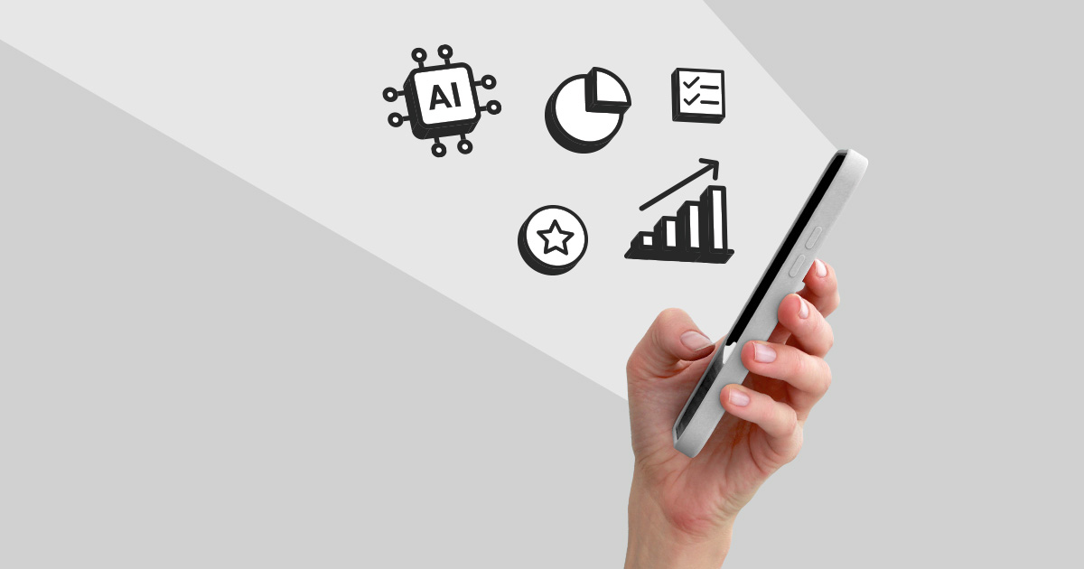 Smartphone in einer Hand und Icons darüber