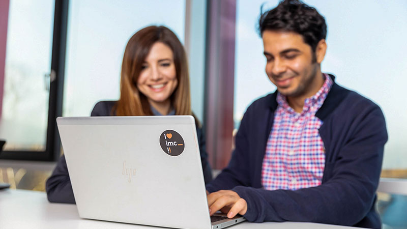 software developers working on laptop