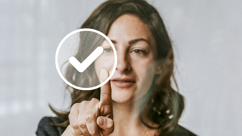 woman interacts with approval tick