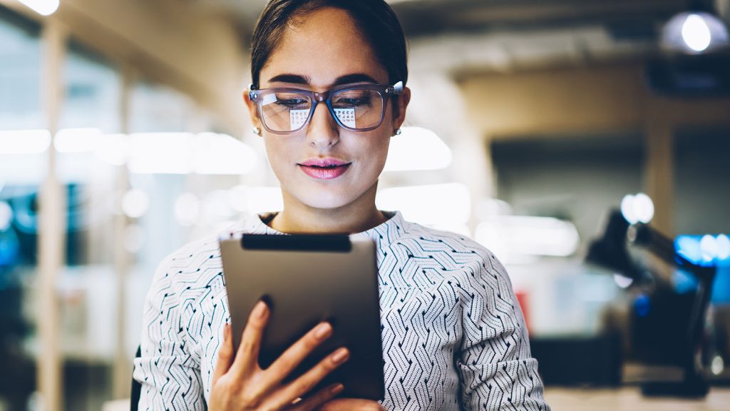 Woman enjoys benifits of her digital eco system