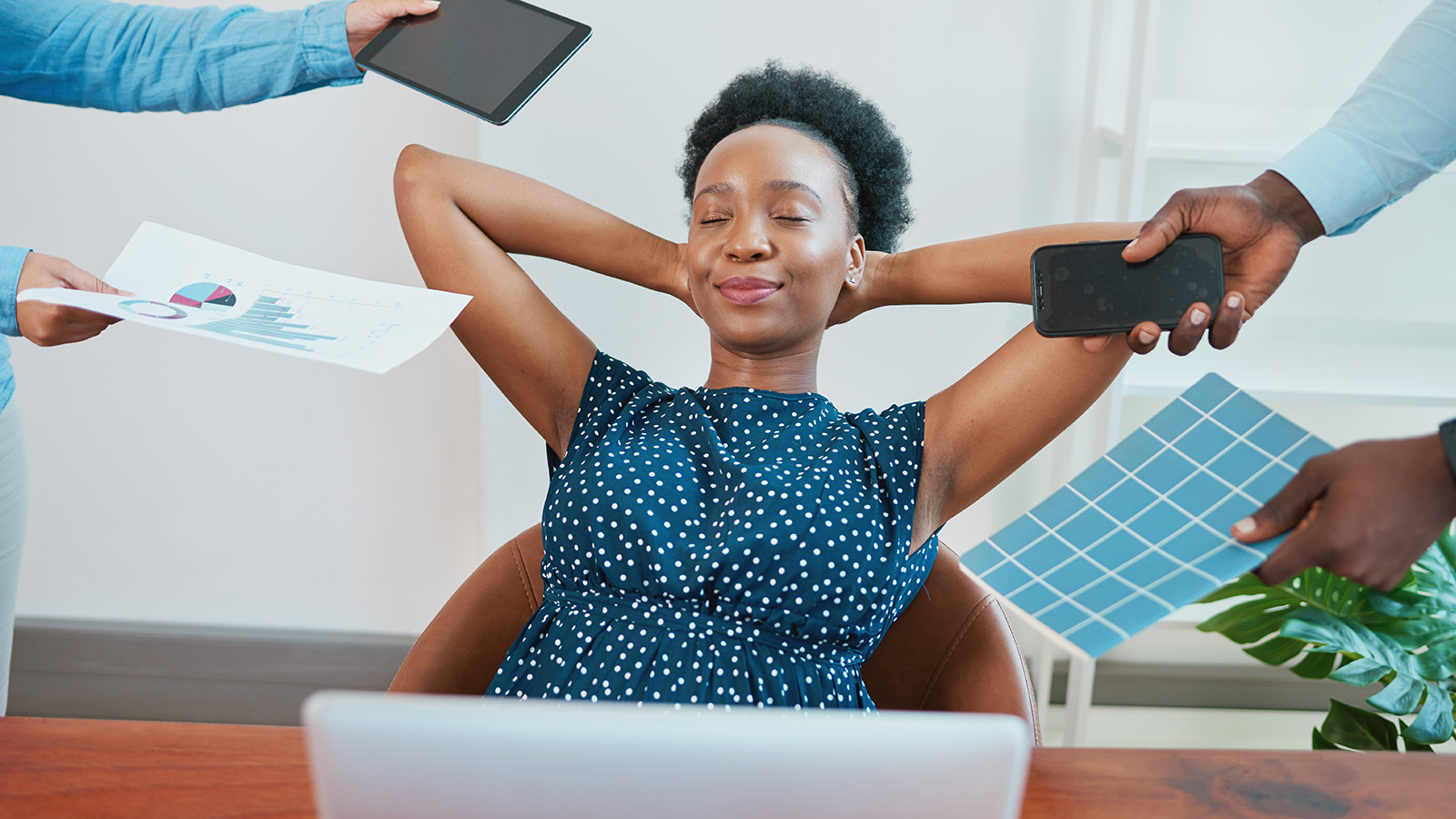 woman relaxing behind laptop
