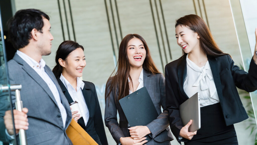 Four individuals from Singapore IMC are meeting