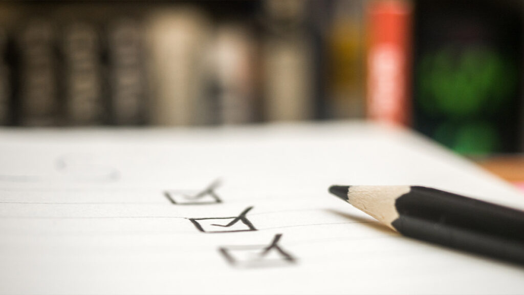 Picture of ticked boxes and a pencil