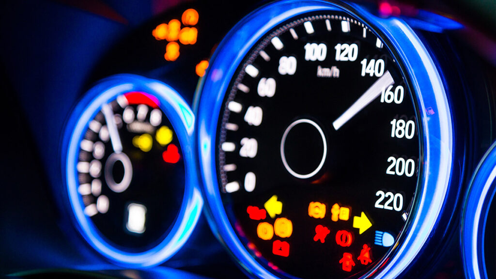 Speedometer representing the risks of inadequate compliance training